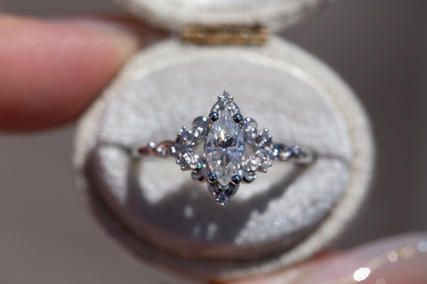 Aurora setting with marquise moissanite