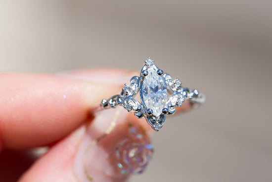 Aurora setting with marquise moissanite