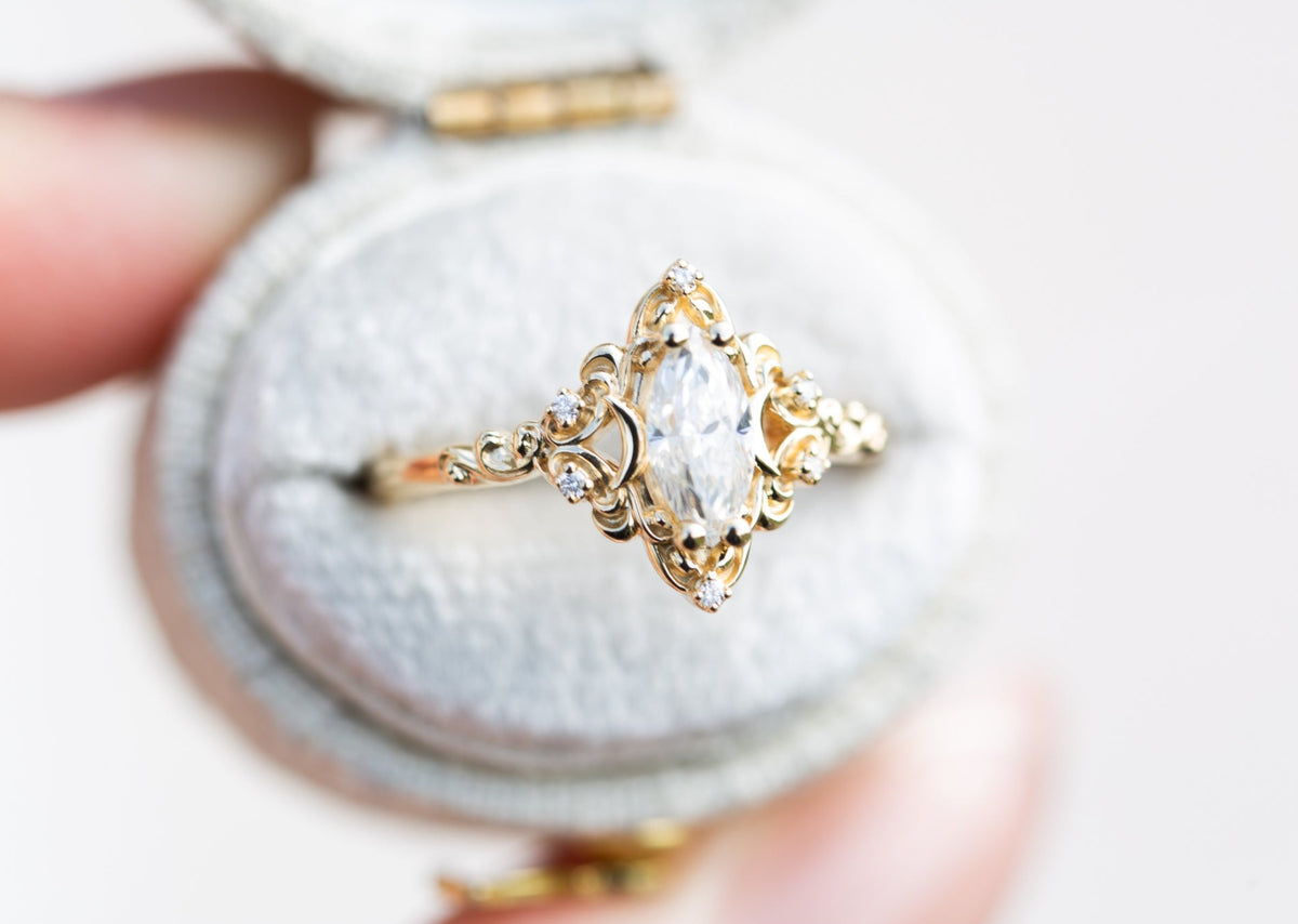 Aurora Moon setting with marquise moissanite