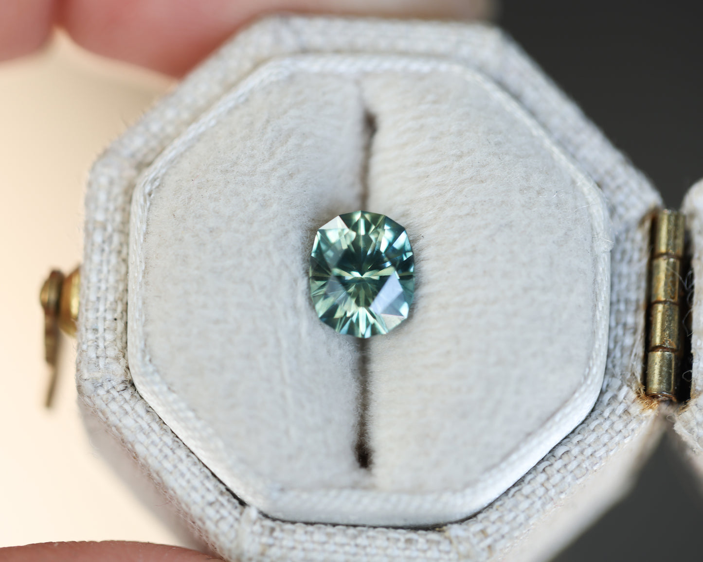 1.06ct oval parti teal sapphire