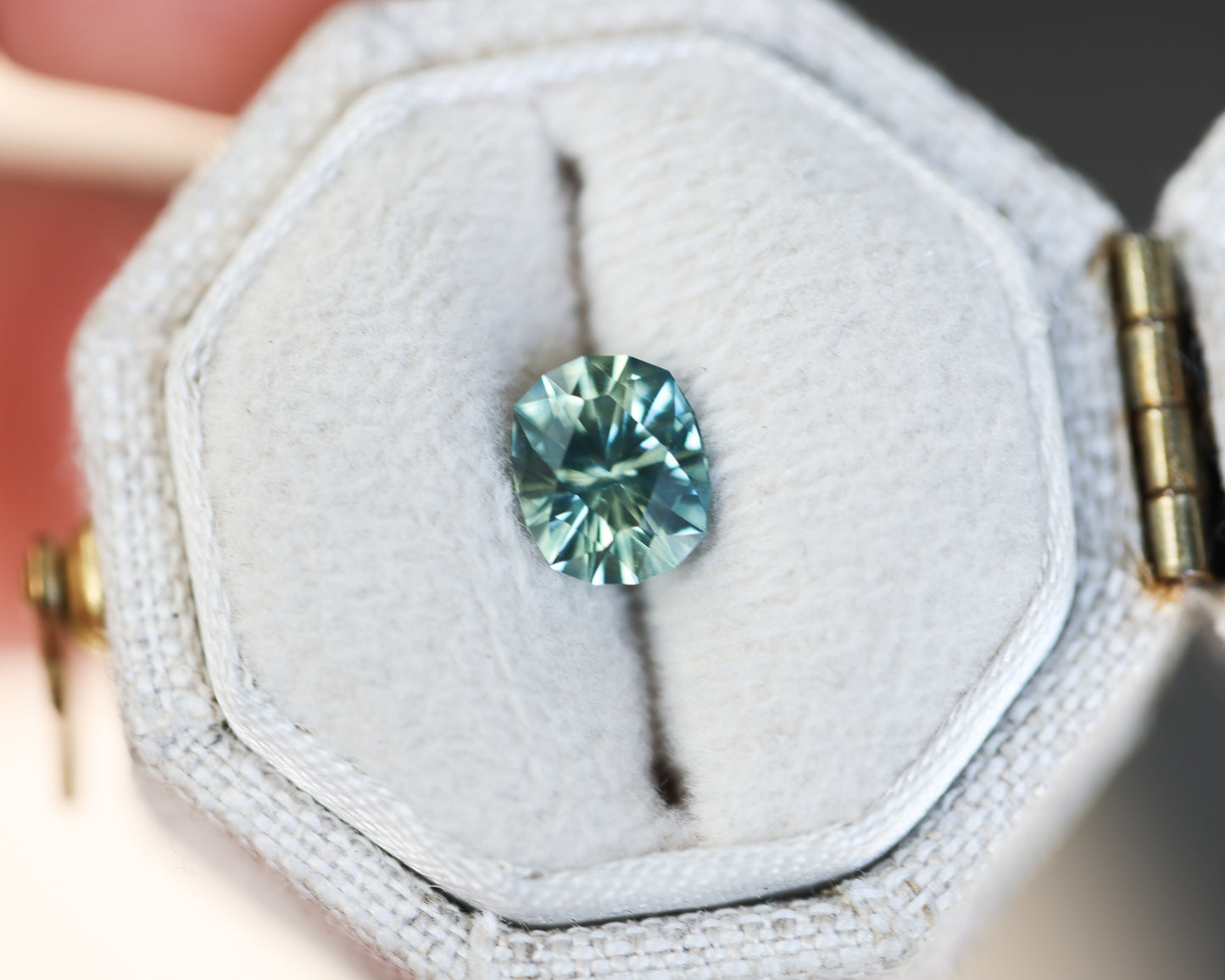 1.06ct oval parti teal sapphire