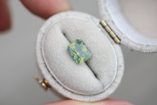 2.14ct emerald cut opalescent green yellow sapphire