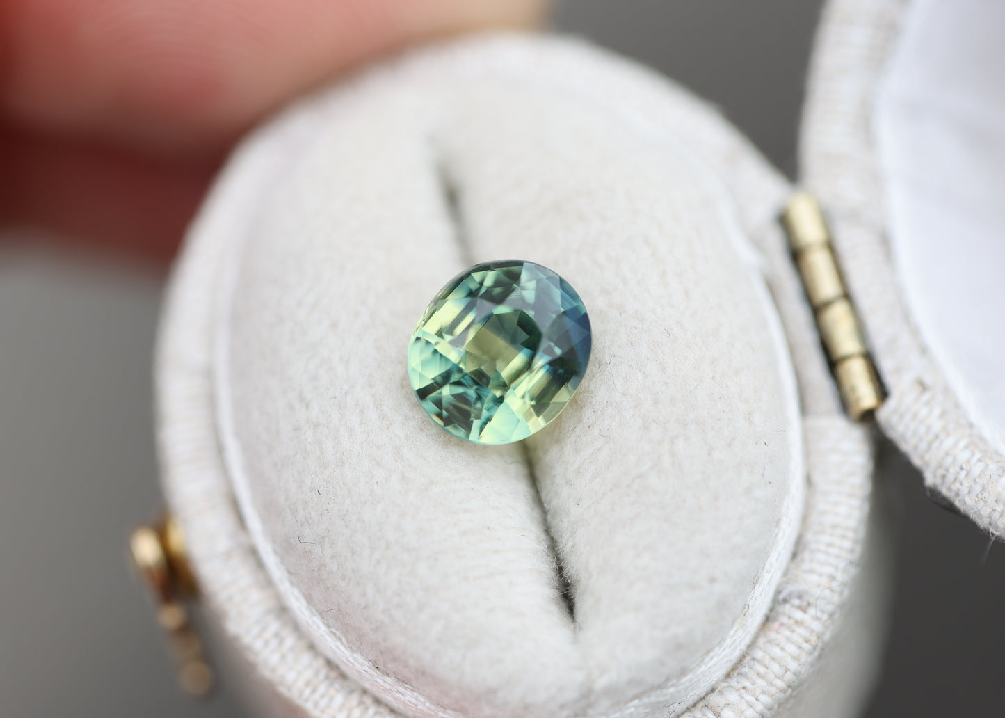 2.14ct oval parti teal green sapphire