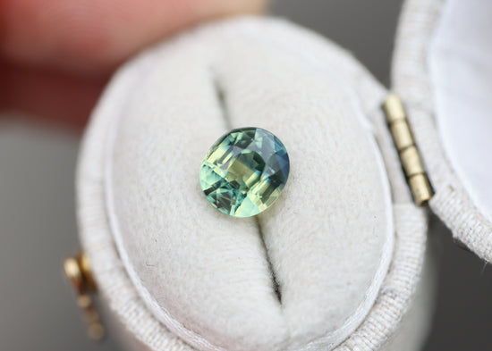 2.14ct oval parti teal green sapphire