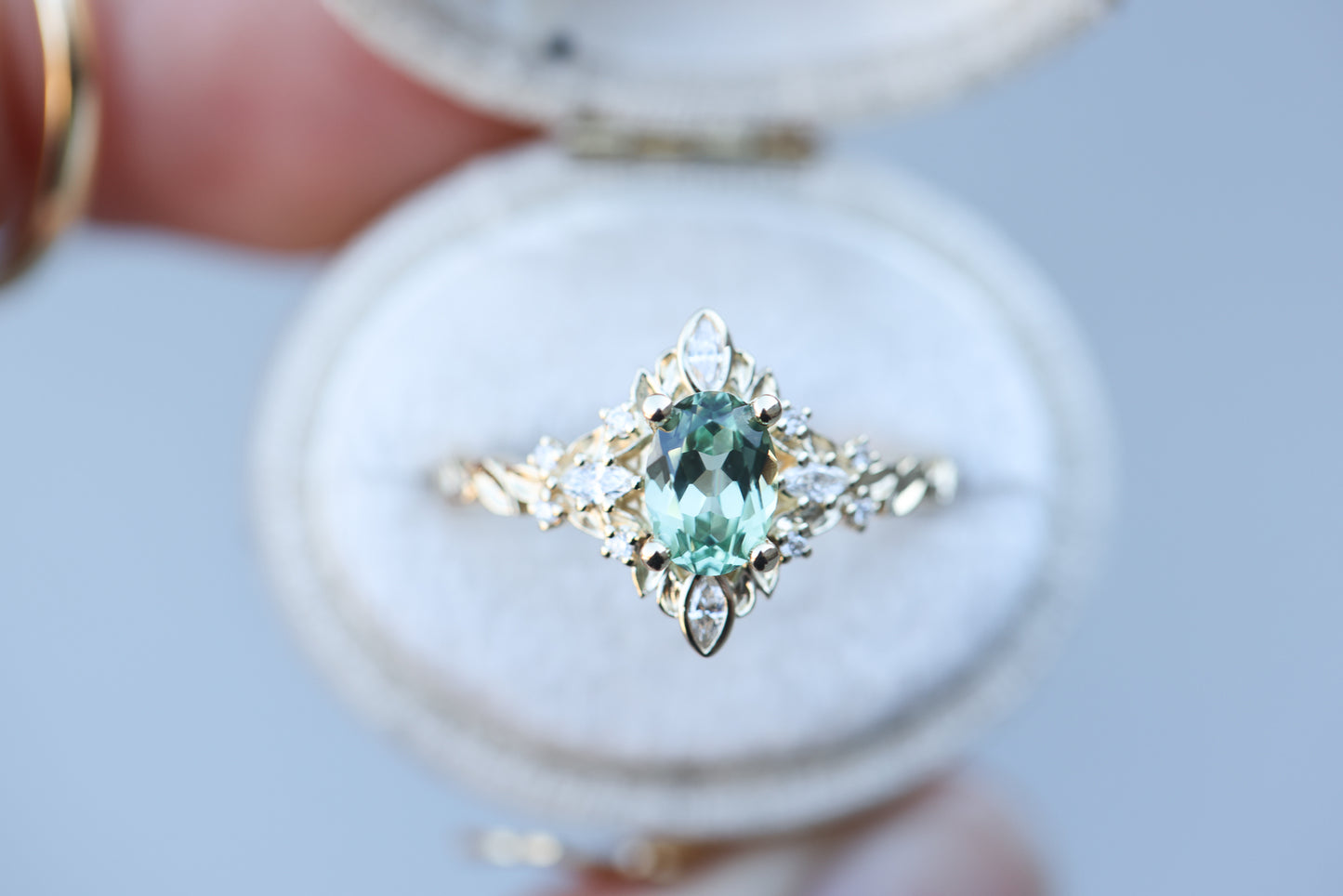 Galadriel setting with oval 7x5mm lab green sapphire