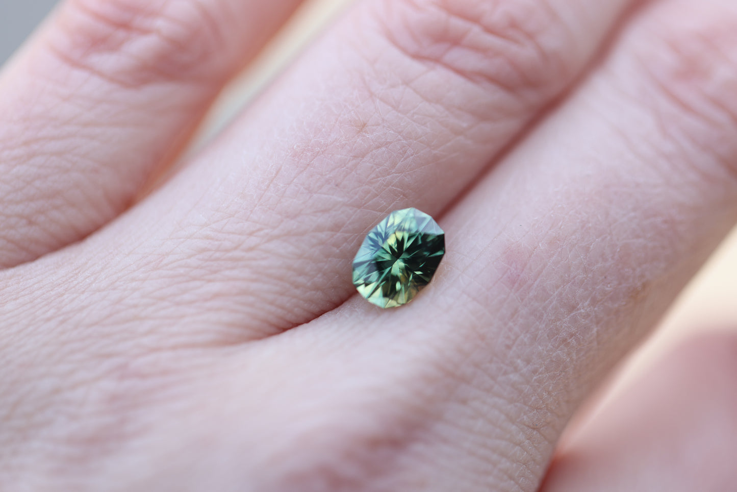 1.82ct oval gren teal yellow sapphire from Earth's Treasury