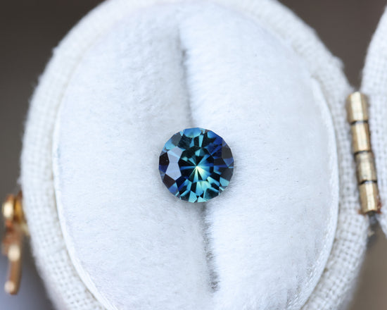 1.21ct round blue teal sapphire, Sunburst cut by John Dyer