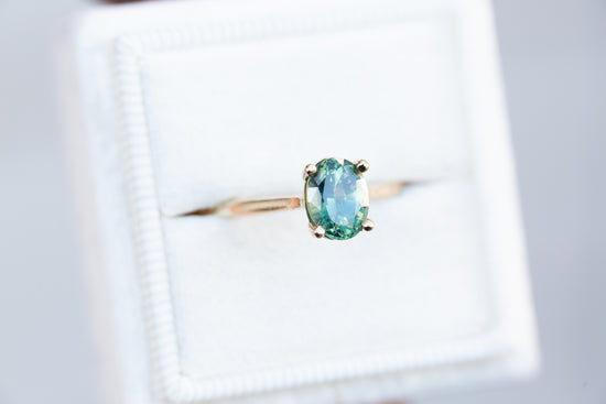 The Elora setting with oval teal green sapphire