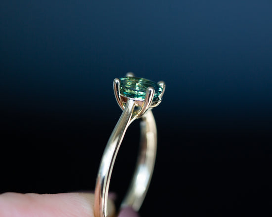 The Elora setting with oval teal green sapphire