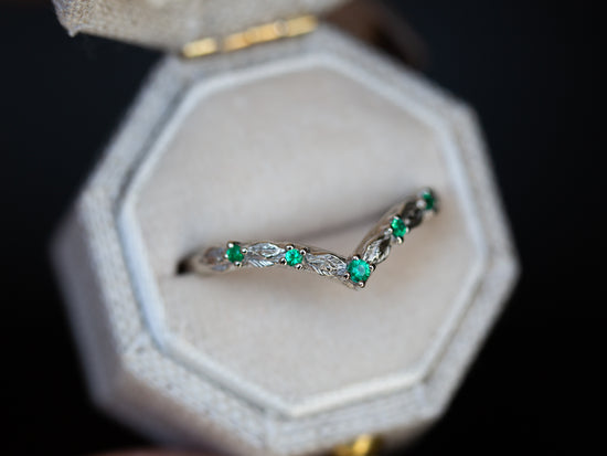 Chevron leaf band with emeralds