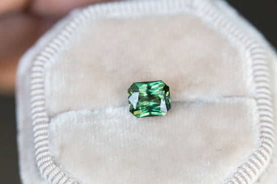 1.55ct Green emerald cut sapphire