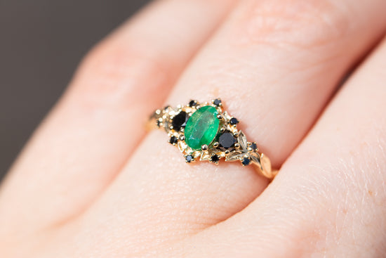 Briar rose three stone with natural emerald and black diamonds