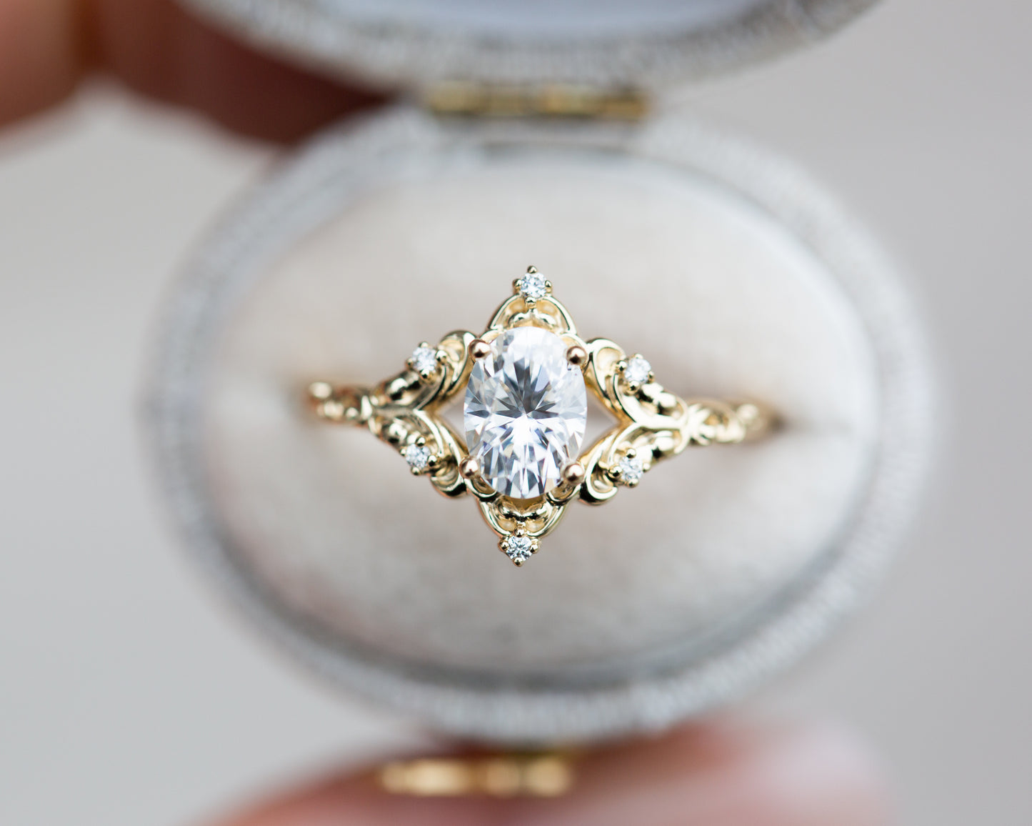 The Aurora setting with oval moissanite