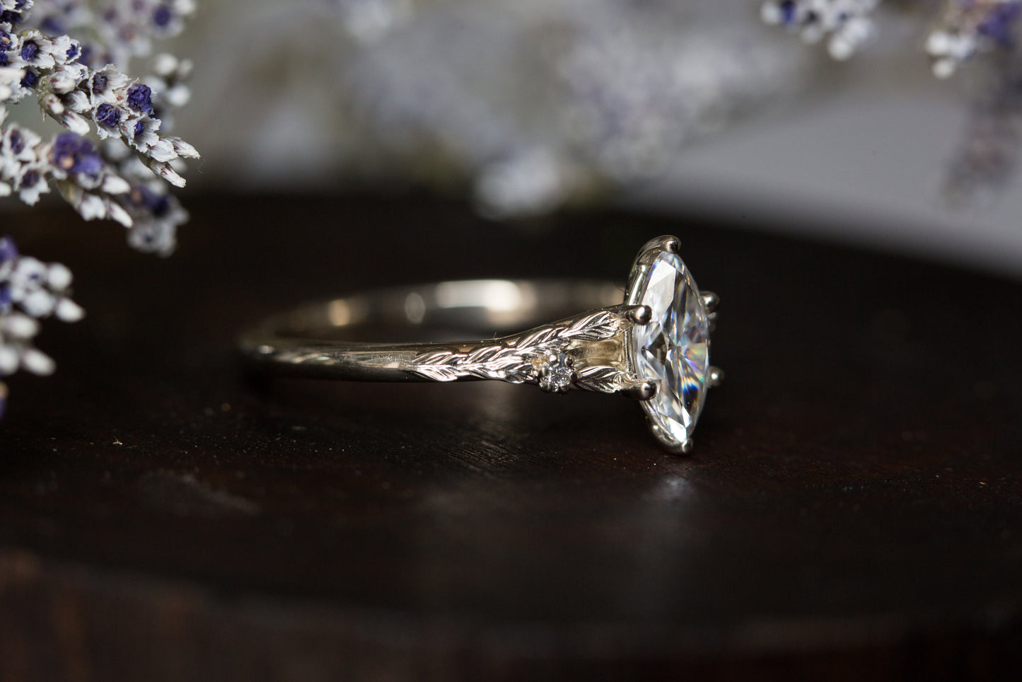 Marquise moissanite leaf cathedral engagement ring
