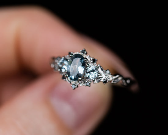 Briar rose three stone with grey spinel and black diamonds