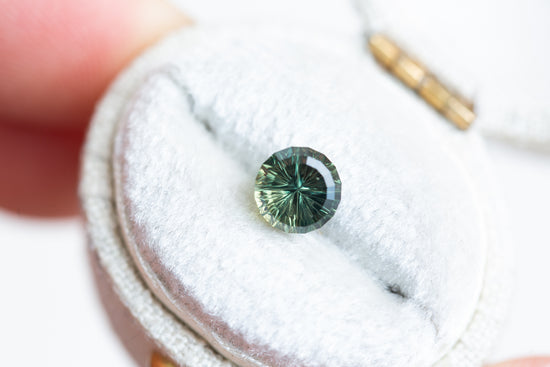 1.49ct parti darker green round StarBrite sapphire- Cut by John Dyer