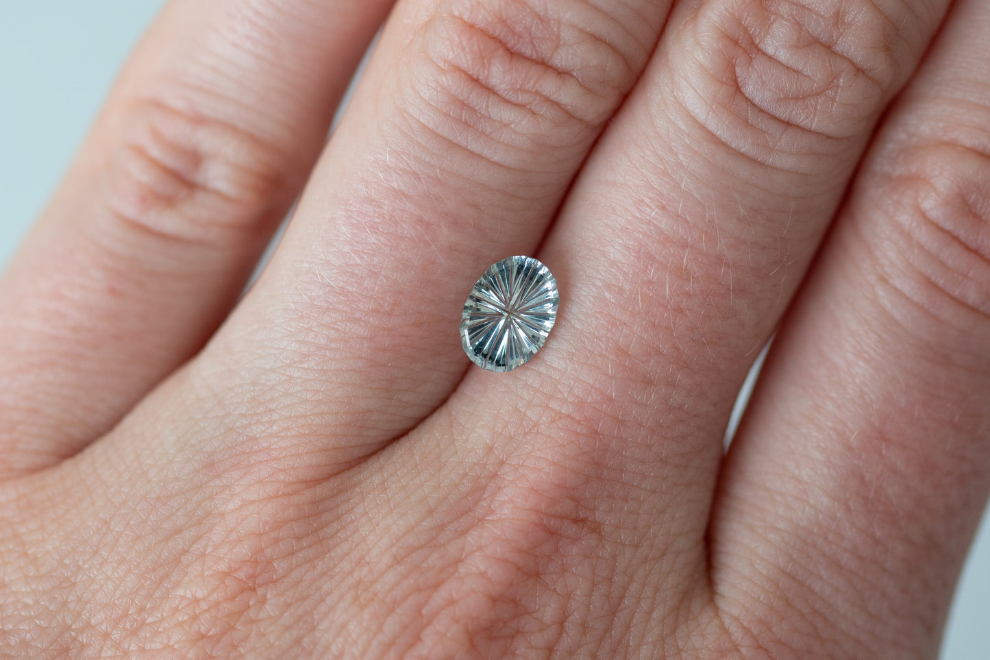 1.05ct Oval Icy Blue Sapphire, Starbrite cut by John Dyer