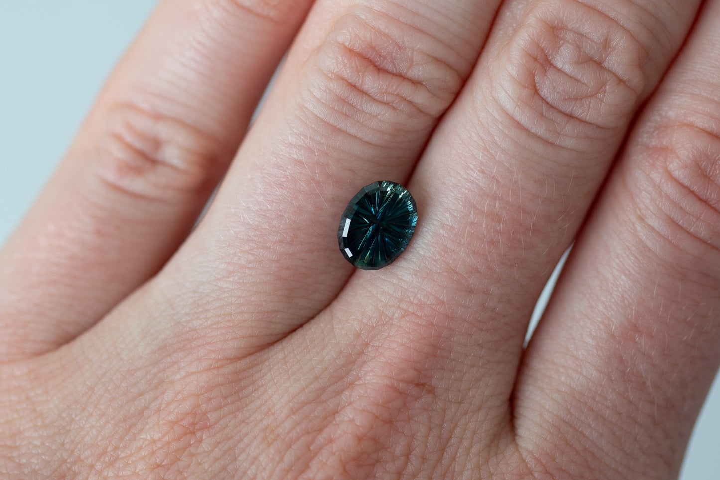 2.12ct Oval Deep Teal Green Sapphire, Starbrite cut by John Dyer