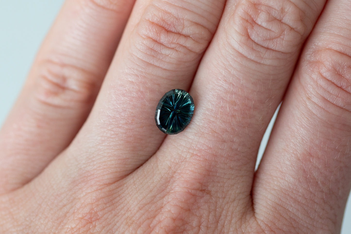 2.12ct Oval Deep Teal Green Sapphire, Starbrite cut by John Dyer