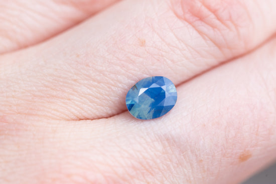 1.97ct oval opalescent blue sapphire
