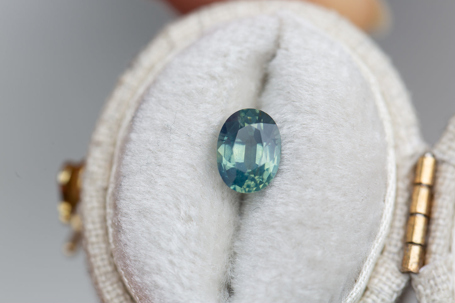 1.12ct oval opalescent teal sapphire