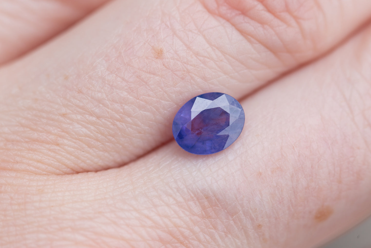 Load image into Gallery viewer, 1.67ct oval opaque purple sapphire
