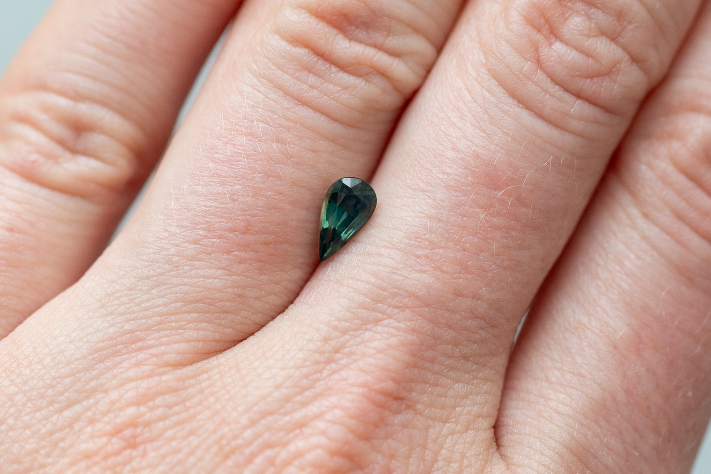 0.81ct Pear Green Teal Sapphire