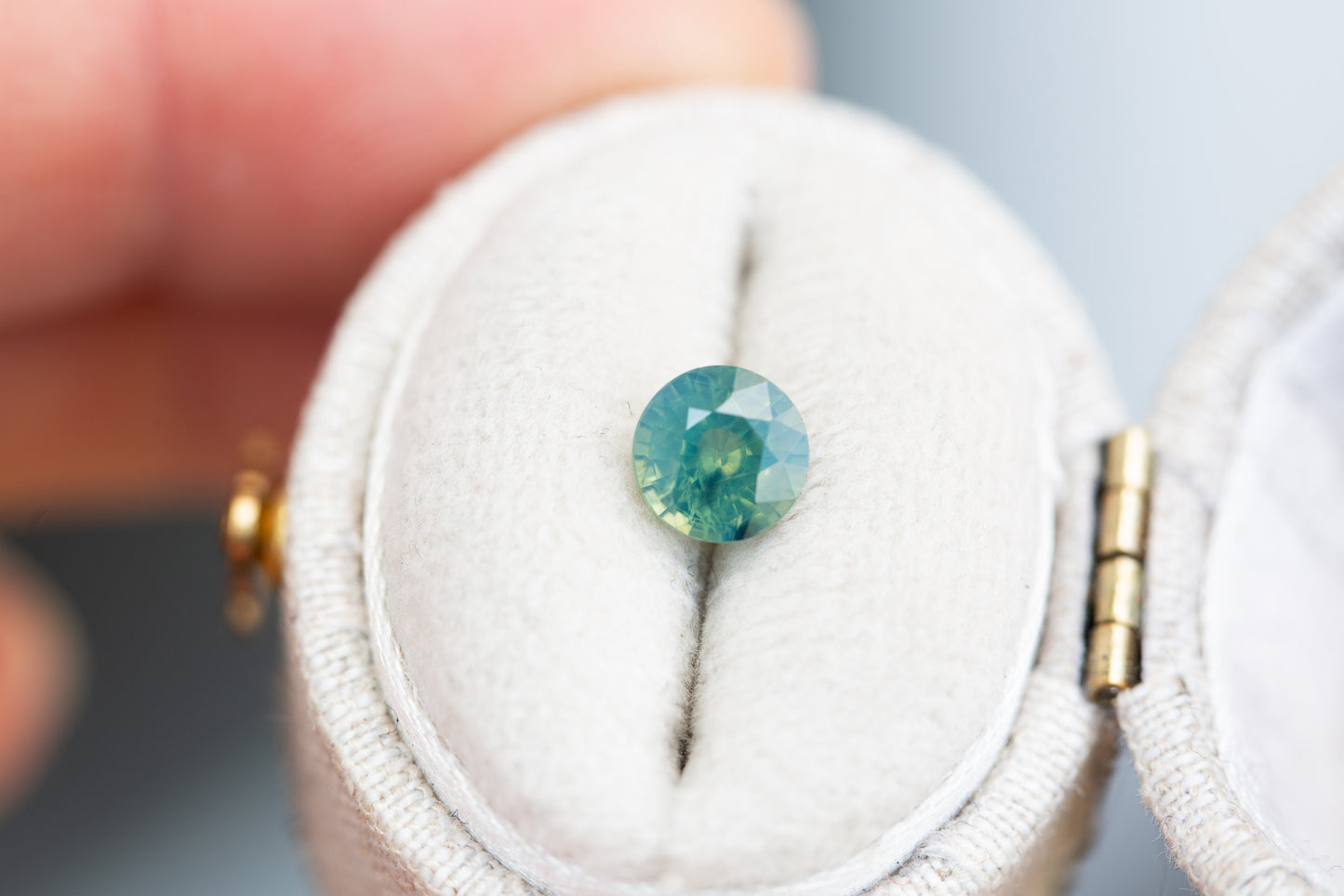 1.13ct round opalescent teal sapphire