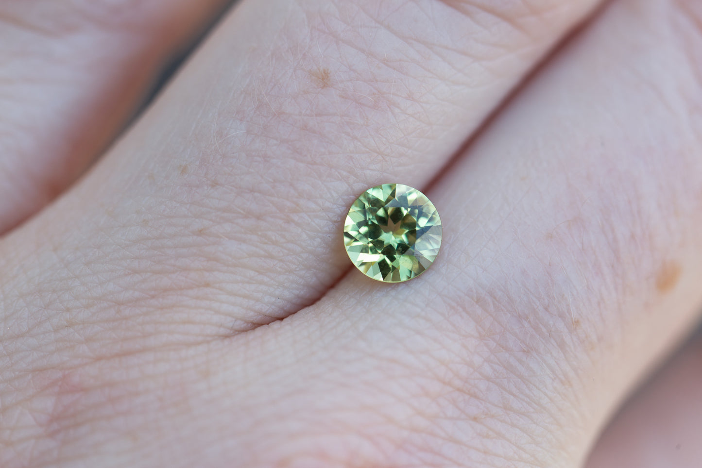 1.1ct round green sapphire
