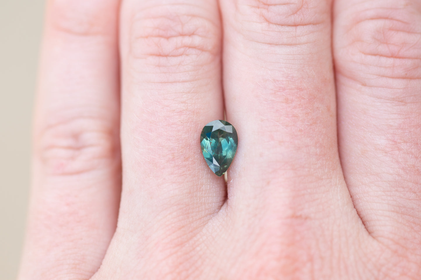 1.66ct Pear Green Teal Sapphire