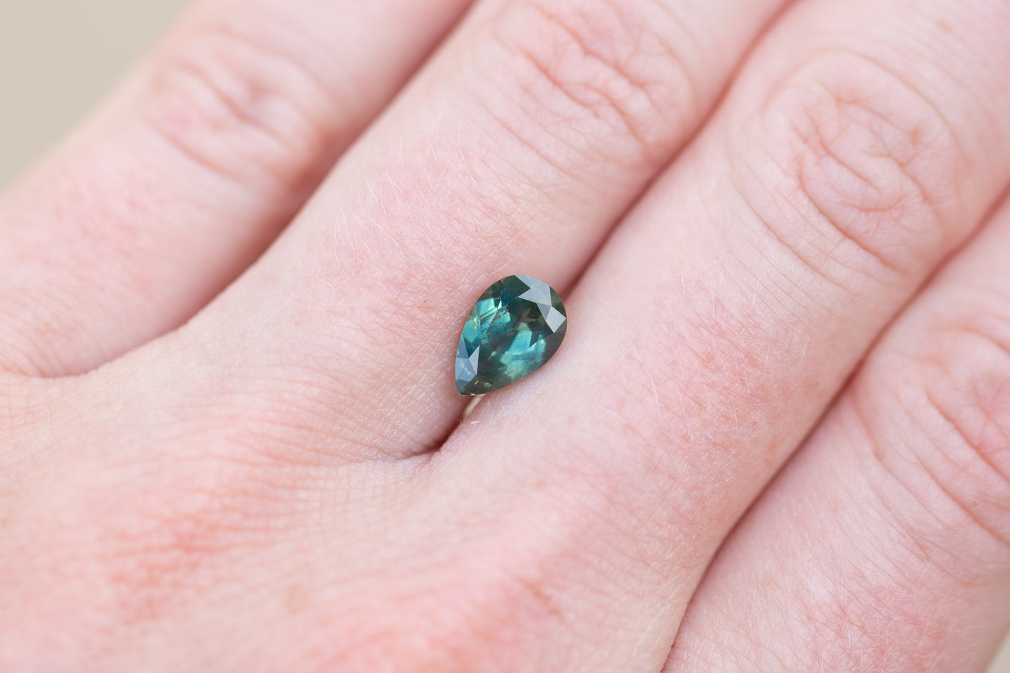 1.66ct Pear Green Teal Sapphire