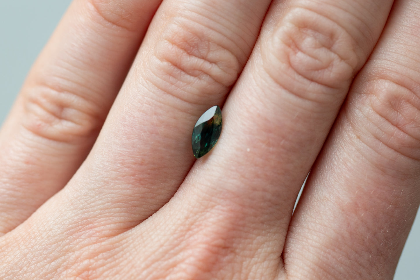 1.12ct Marquise Deep Teal Green Orange Sapphire