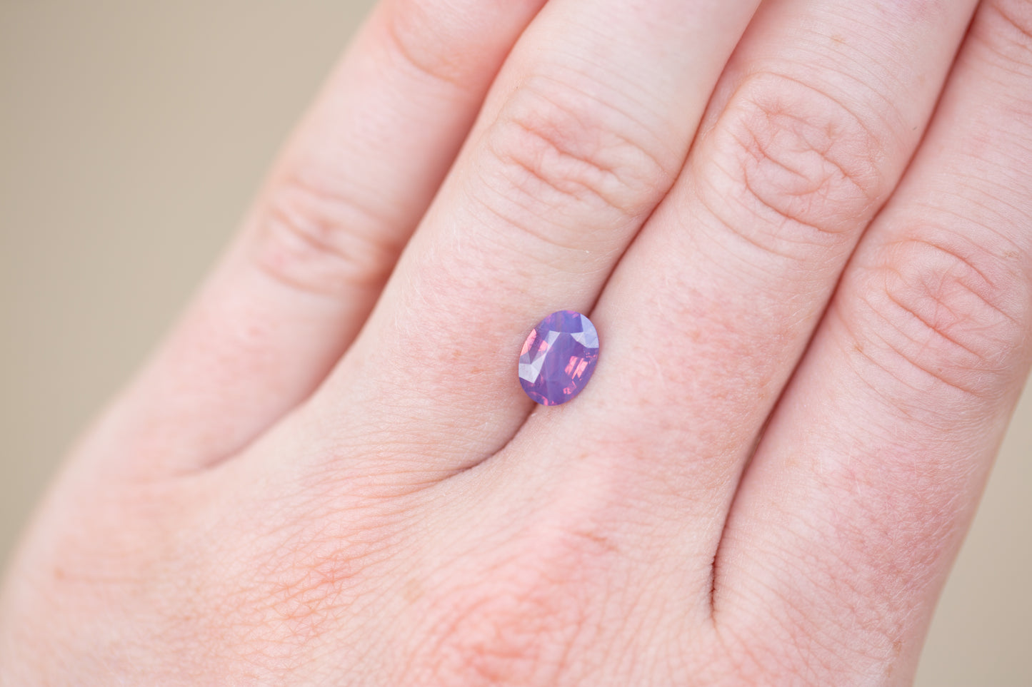 1.51ct Oval Purple and Pink/Orange Opalescent Sapphire