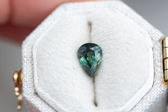 Load image into Gallery viewer, .93ct pear darker green teal sapphire
