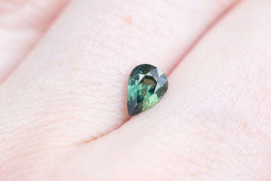 Load image into Gallery viewer, .93ct pear darker green teal sapphire
