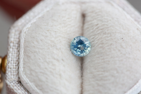 .4ct round opalescent teal blue sapphire