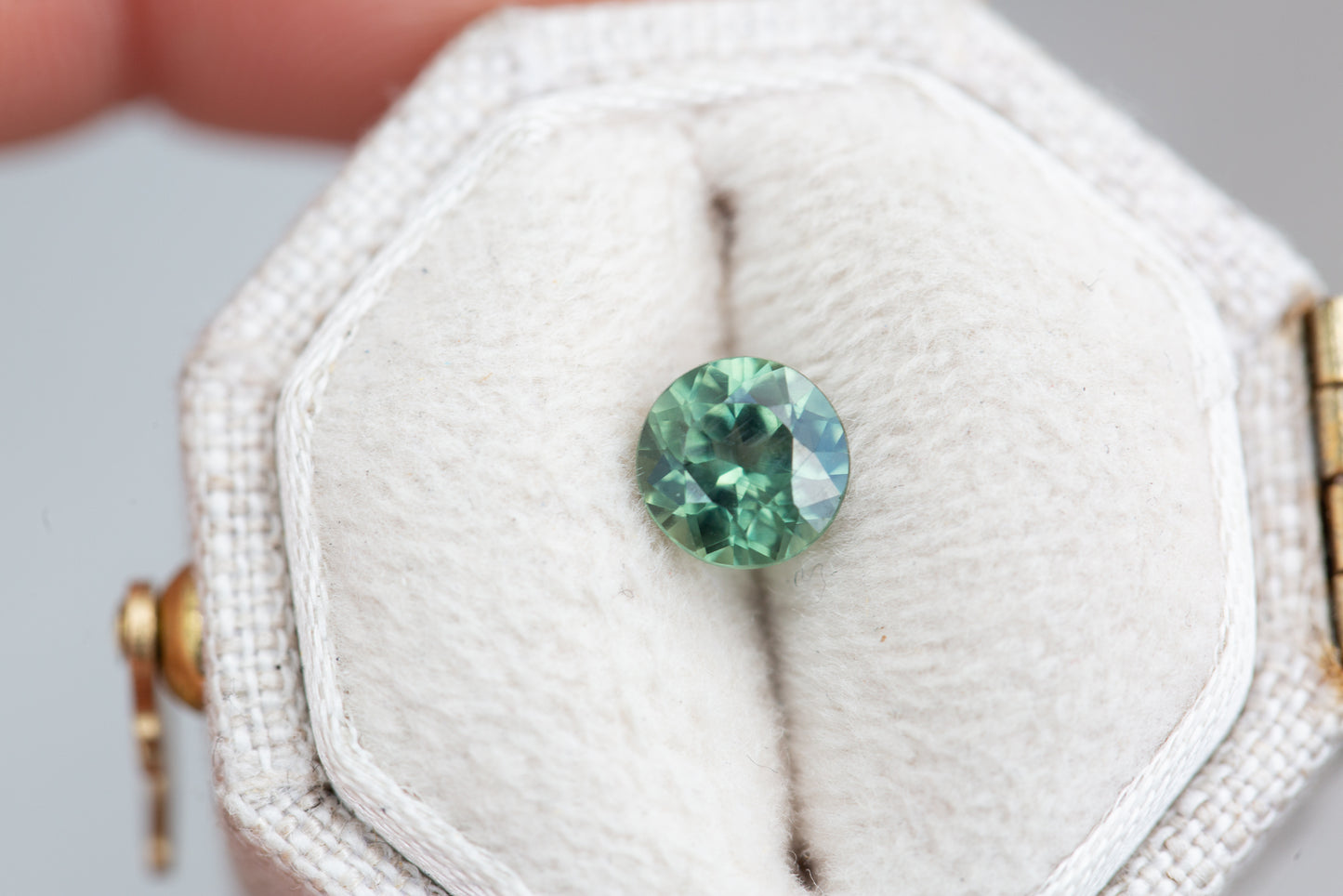 .82ct round teal green sapphire