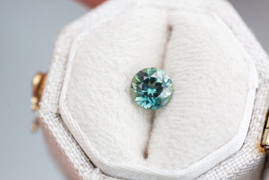 .86ct round teal green sapphire