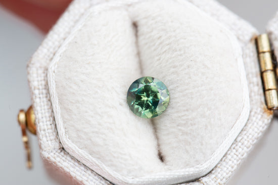 .8ct round teal green sapphire