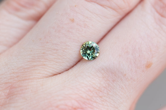 .73ct round teal green yellow sapphire