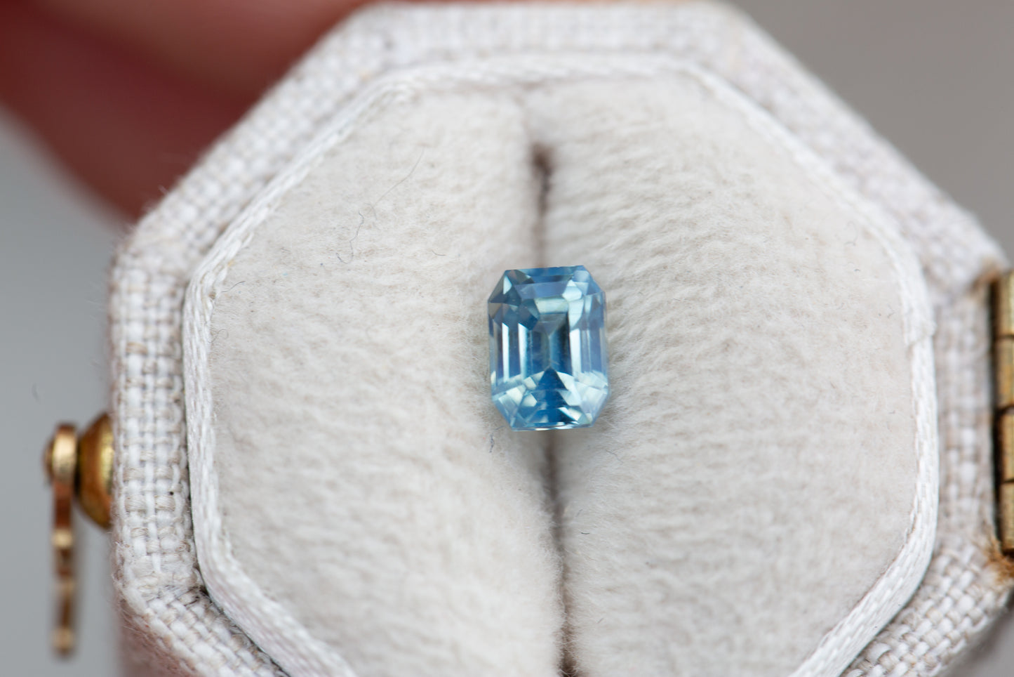 .9ct emerald cut opalescent blue sapphire