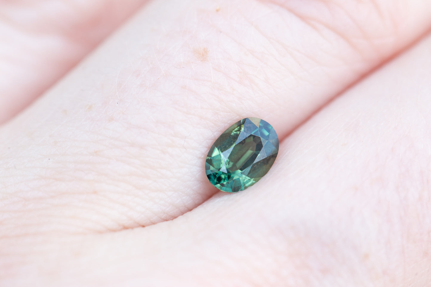 1ct oval teal green sapphire