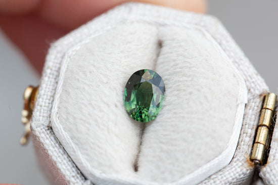 1.03ct oval dark green sapphire