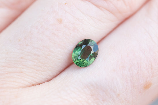 1.03ct oval dark green sapphire