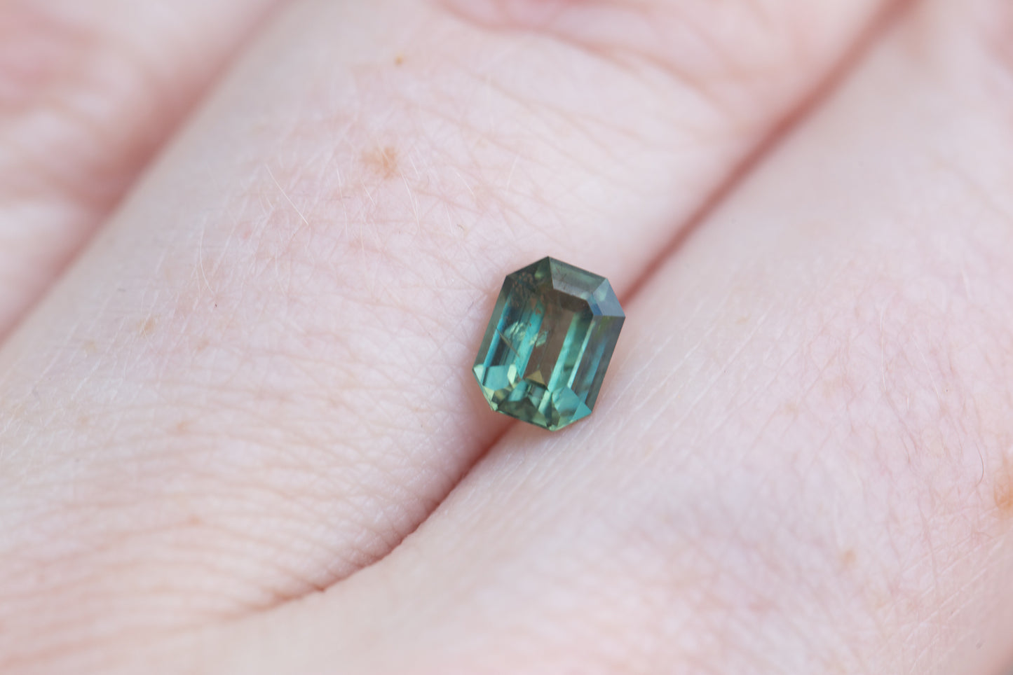 Load image into Gallery viewer, .945ct emerald green teal sapphire
