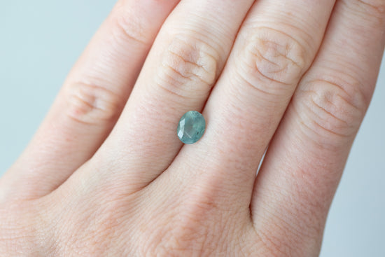 1.54ct Oval Opalescent Sea Green Sapphire