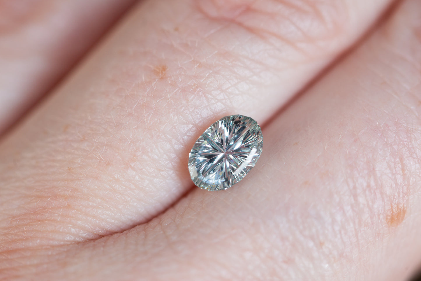 1.59ct oval silver Starbrite sapphire cut by John Dyer
