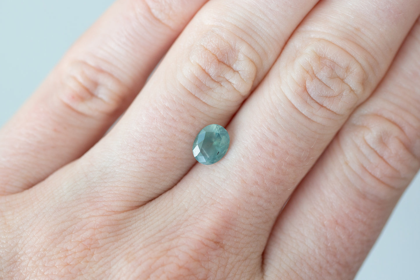 1.54ct Oval Opalescent Sea Green Sapphire