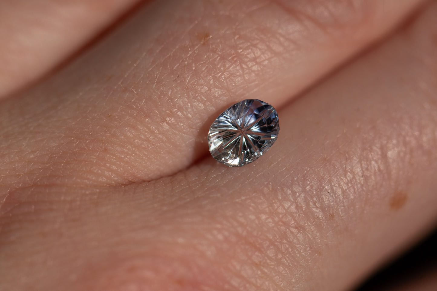 1.89ct oval icy bicolor sapphire, Starbrite cut from John Dyer