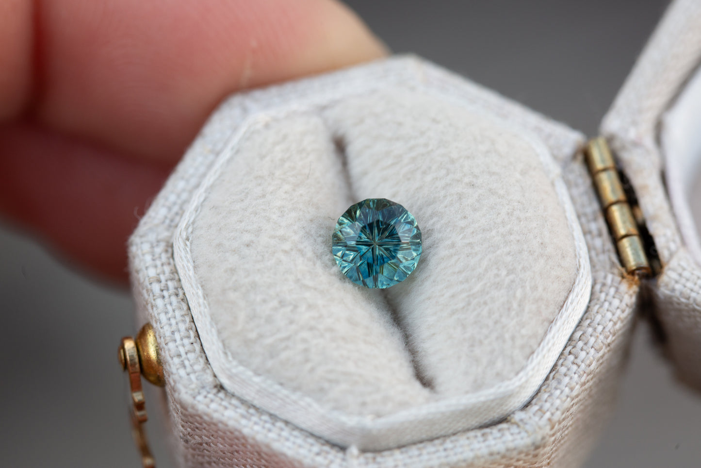 1.23ct round teal sapphire - Starbrite cut by John Dyer